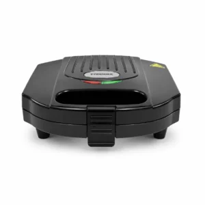 ostadora pequena Premier electrica de color negro cerrada con luces indicadoras verde y roja