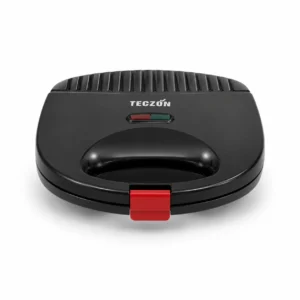 ostadora pequena Teczon electrica en color negro con seguro de cierre frontal rojo y luces indicadoras